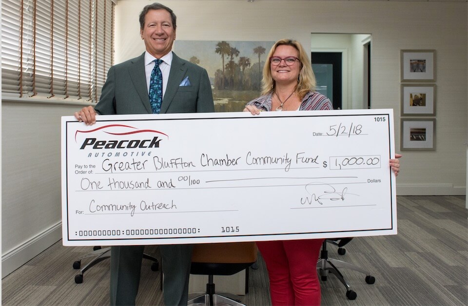 Peacock Automotive President & CEO Warner Peacock presented Shellie West, CEO of the Greater Bluffton Chamber of Commerce, a check for ,000 to kick off the fundraising efforts of the Greater Bluffton Chamber Community Fund