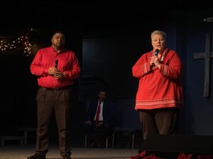 Paul Anderson Youth Home staff members Eileen Whitfield (Right) and Steven Richardson (Left) perform together at the Christmas Extravaganza.