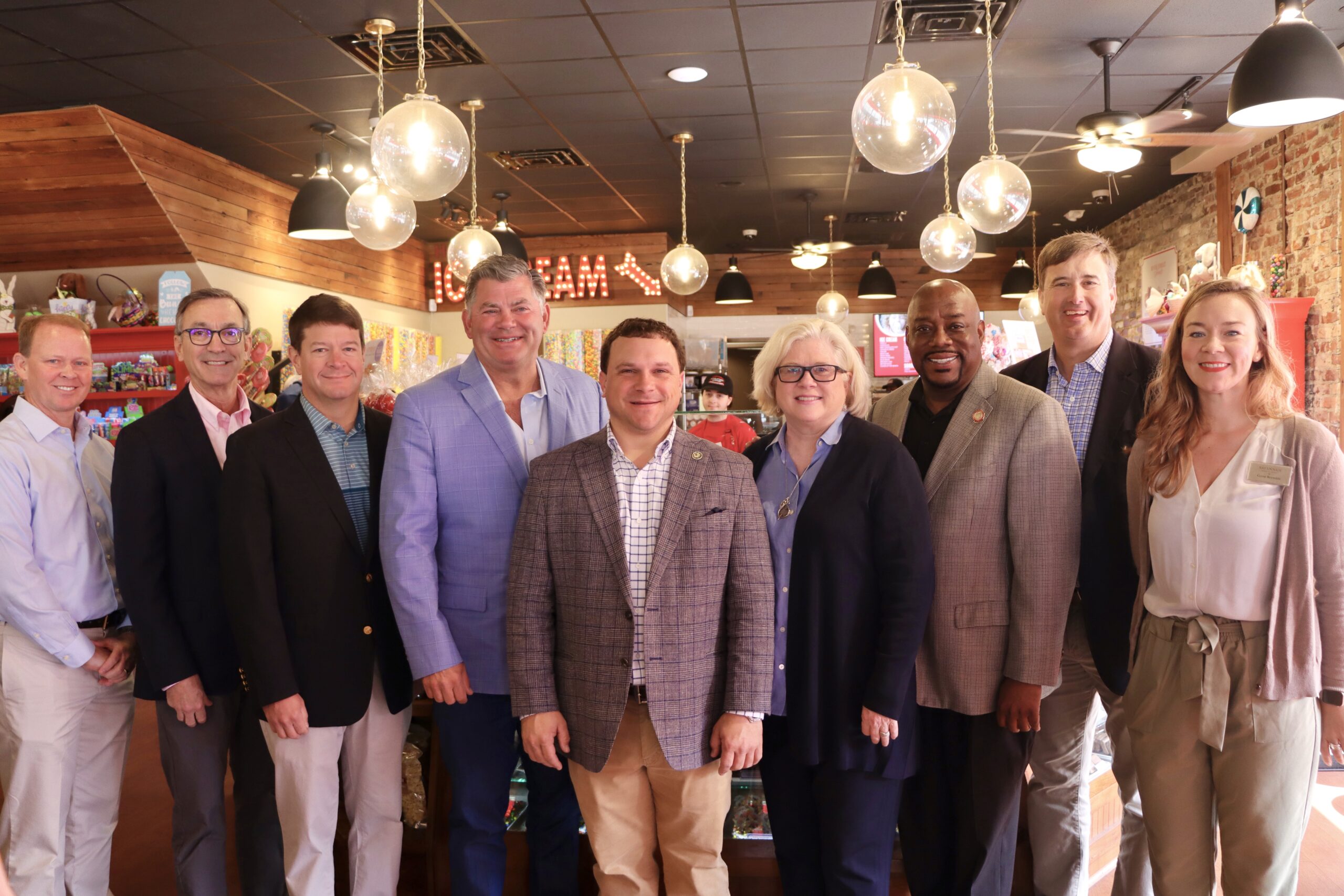 Pictured (L to R): Glen Willard, River Street Sweets • Savannah's Candy Kitchen® Franchise Owner in Pooler, Ga.; Kenny Tarver, co-owner of Mascot Pecan Shelling Co.; Trip Tollison, President & CEO, Savannah Economic Development Authority; Tim Strickland, co-owner of River Street Sweets; Tyler Harper, Commissioner of Agriculture for the State of Georgia; Jennifer Strickland, co-owner of River Street Sweets; Mayor Van Johnson, City of Savannah; Bert Brantley, President & CEO, Savannah Area Chamber of Commerce; and Conni Reynolds, Small Business and Events Manager, Savannah Area Chamber of Commerce